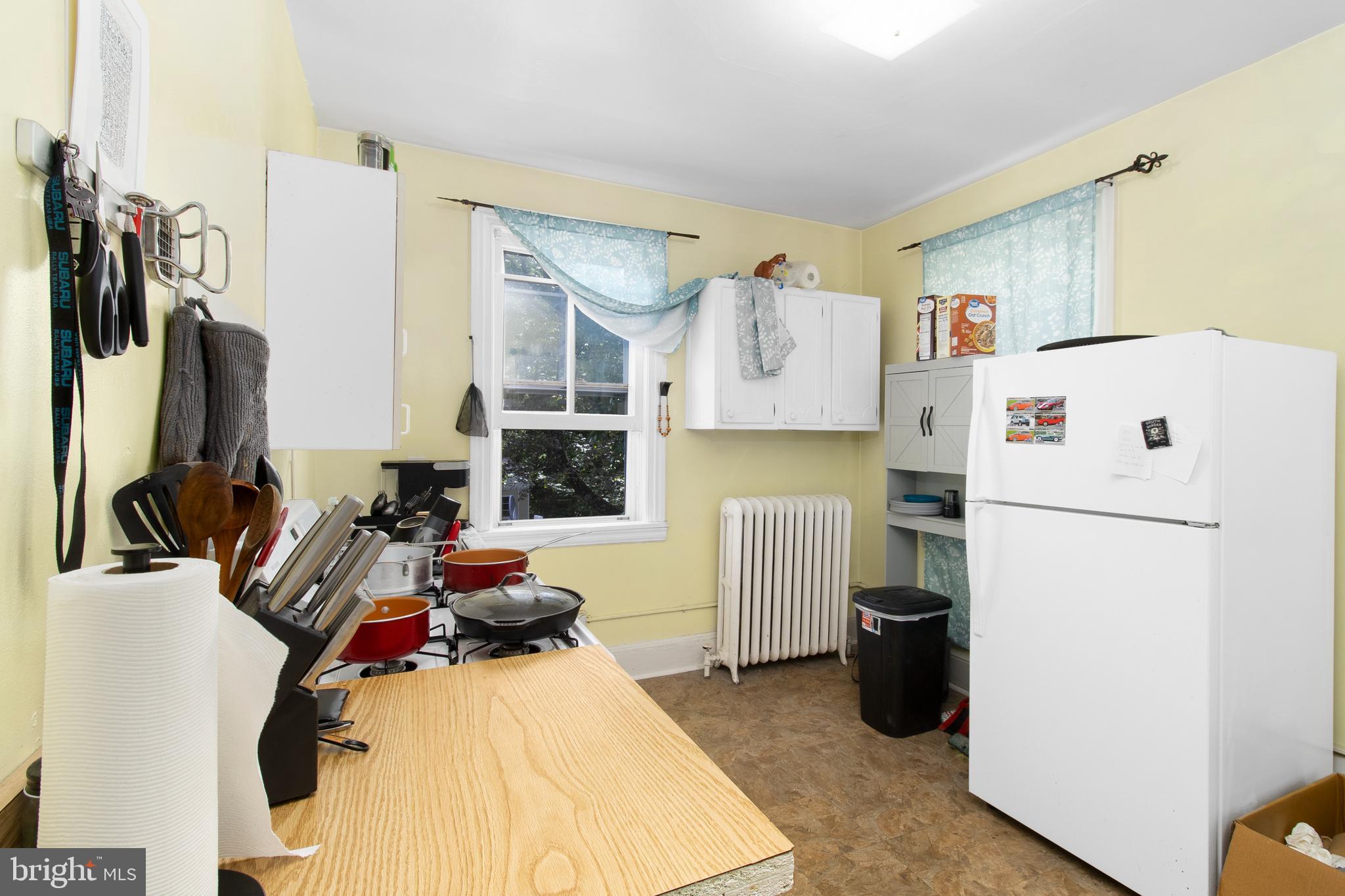 85 Madison Avenue Mount Holly, NJ 08060 - Photo 30 of 41 a kitchen with stainless steel appliances a refrigerator sink and wooden floor