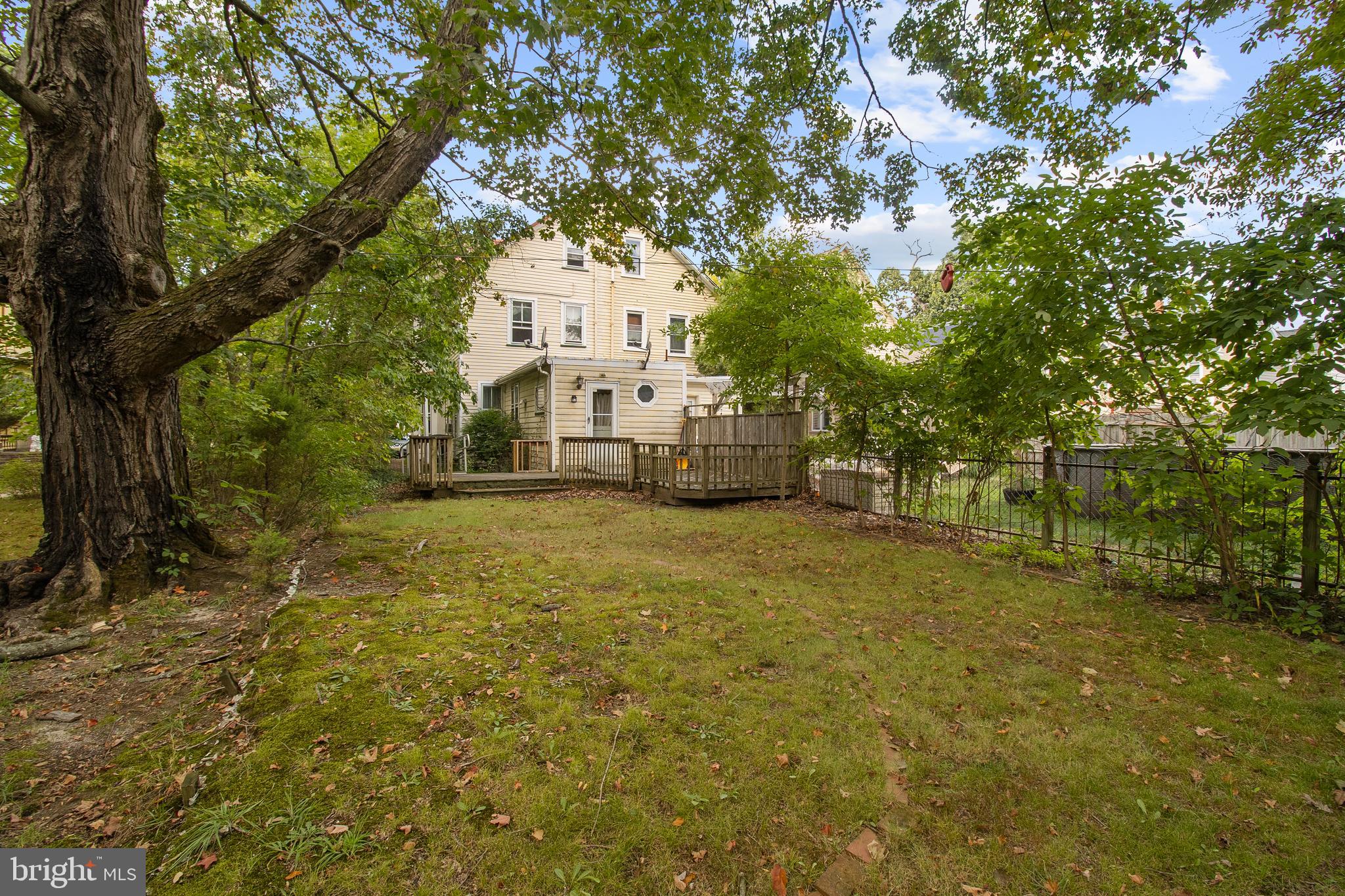 85 Madison Avenue Mount Holly, NJ 08060 - Photo 3 of 41 a front view of a house with a yard