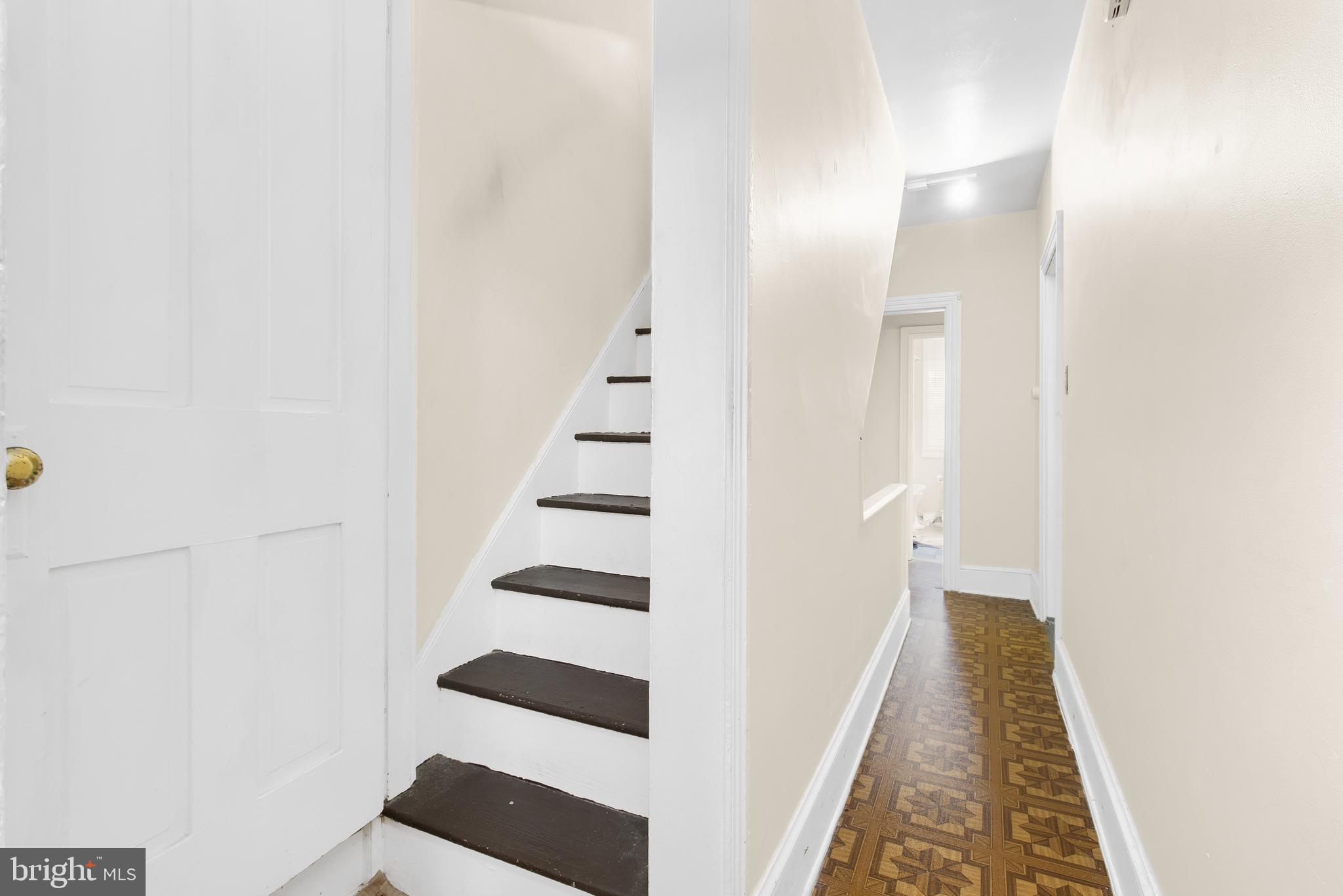 85 Madison Avenue Mount Holly, NJ 08060 - Photo 34 of 41 a view of a room with stairs and wooden floor