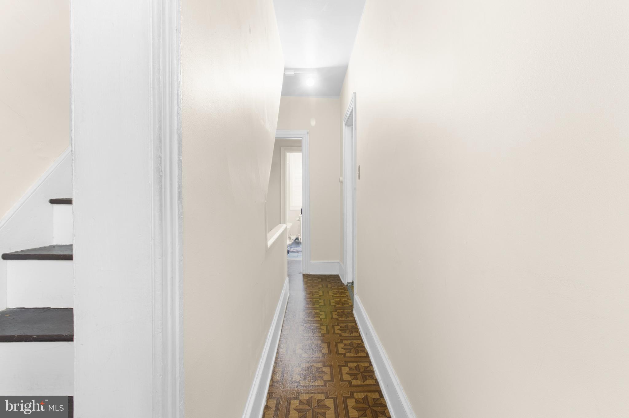 85 Madison Avenue Mount Holly, NJ 08060 - Photo 40 of 41 a view of a hallway with wooden floor