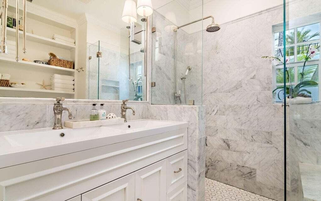 156 Peruvian Avenue Palm Beach, FL 33480 - Photo 11 of 20 a bathroom with a sink and a mirror