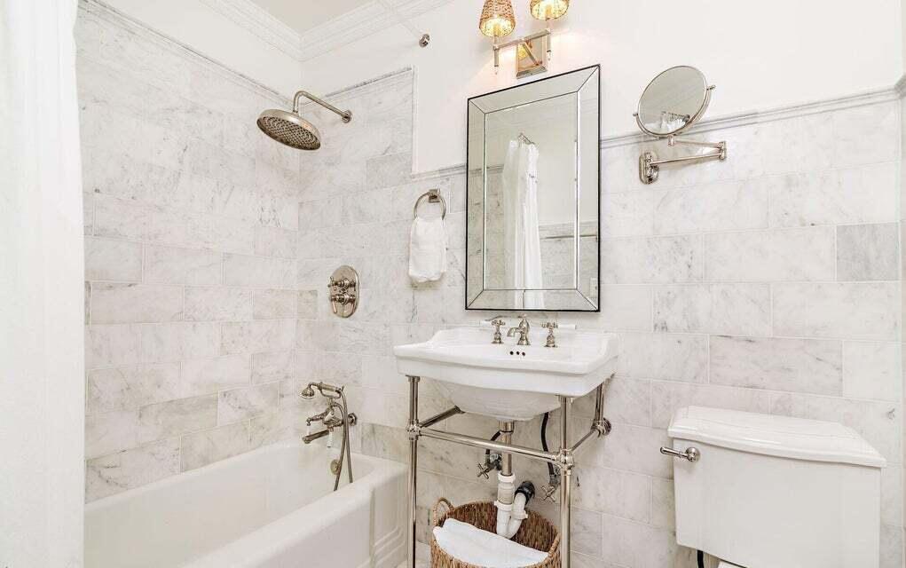 156 Peruvian Avenue Palm Beach, FL 33480 - Photo 13 of 20 a bathroom with a sink a toilet and a bathtub