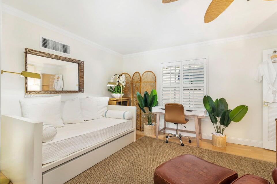 156 Peruvian Avenue Palm Beach, FL 33480 - Photo 14 of 20 a living room with furniture flowerpot and a potted plant