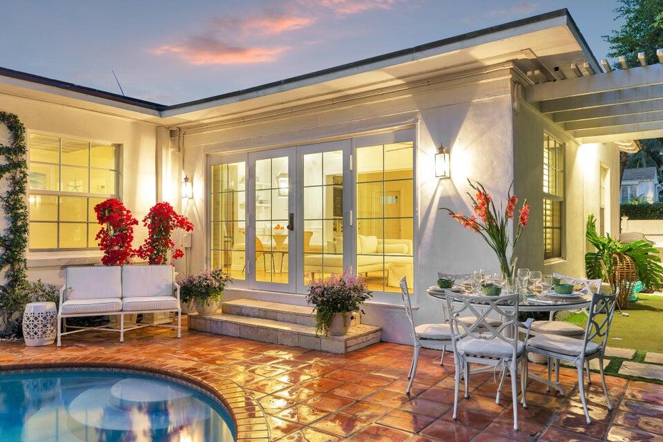 156 Peruvian Avenue Palm Beach, FL 33480 - Photo 17 of 20 a living room filled with furniture and floor to ceiling windows