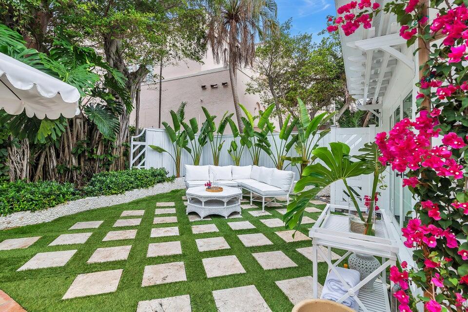 156 Peruvian Avenue Palm Beach, FL 33480 - Photo 18 of 20 a front view of a house with yard