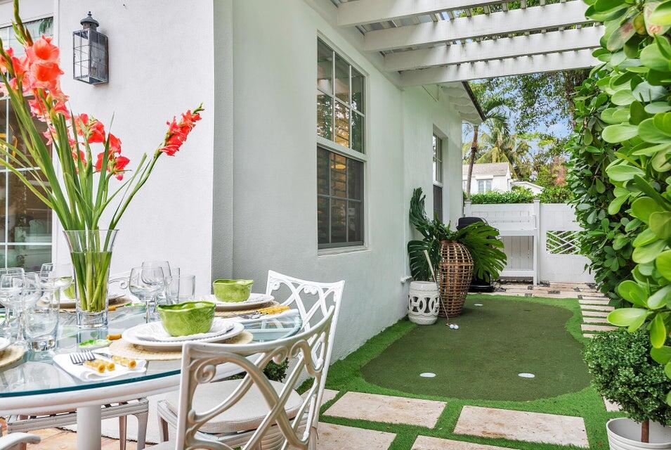 156 Peruvian Avenue Palm Beach, FL 33480 - Photo 19 of 20 a view of a dining room with furniture window and outside view
