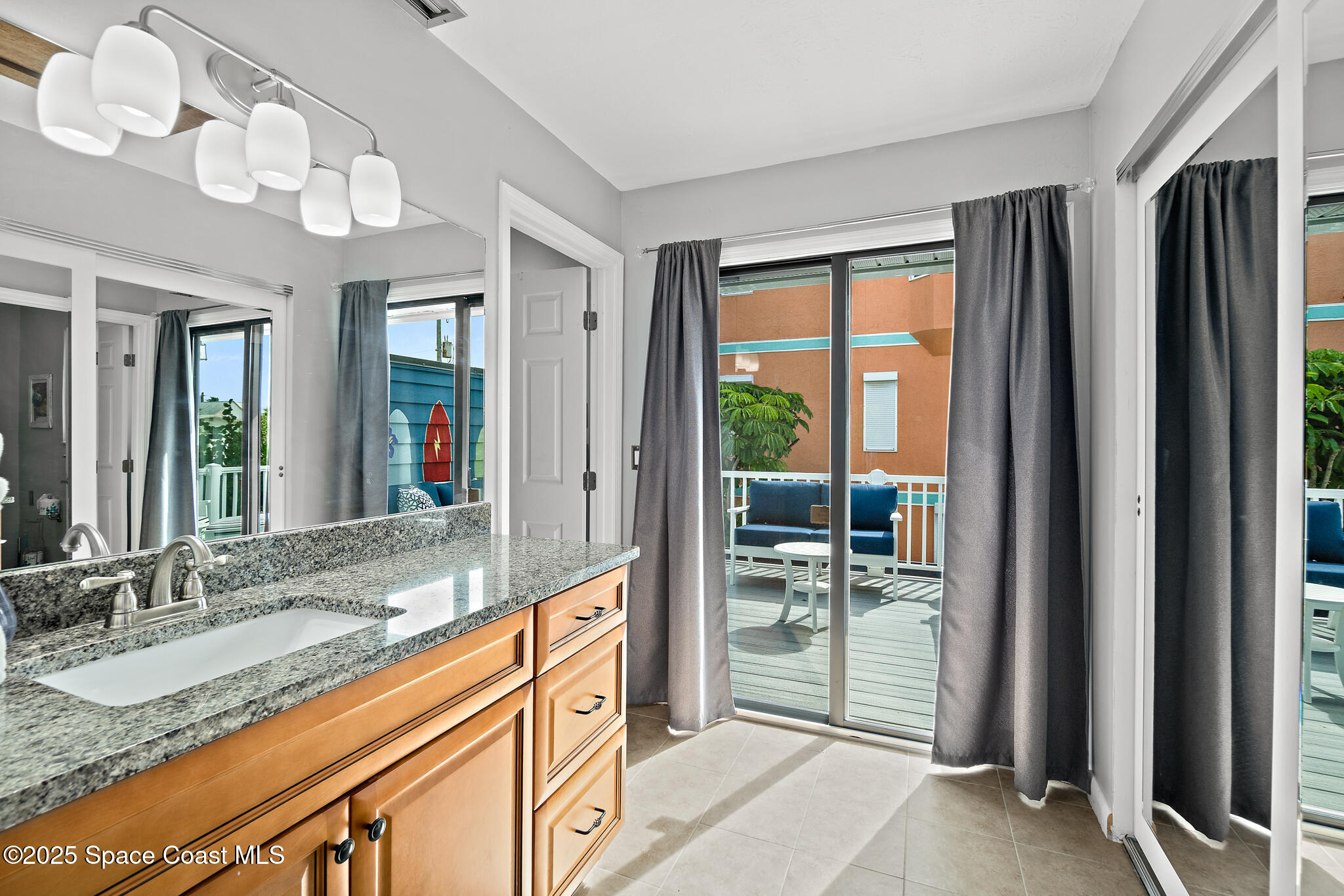 8156 Ridgewood Avenue Cape Canaveral, FL 32920 - Photo 13 of 53 a view of living room and kitchen