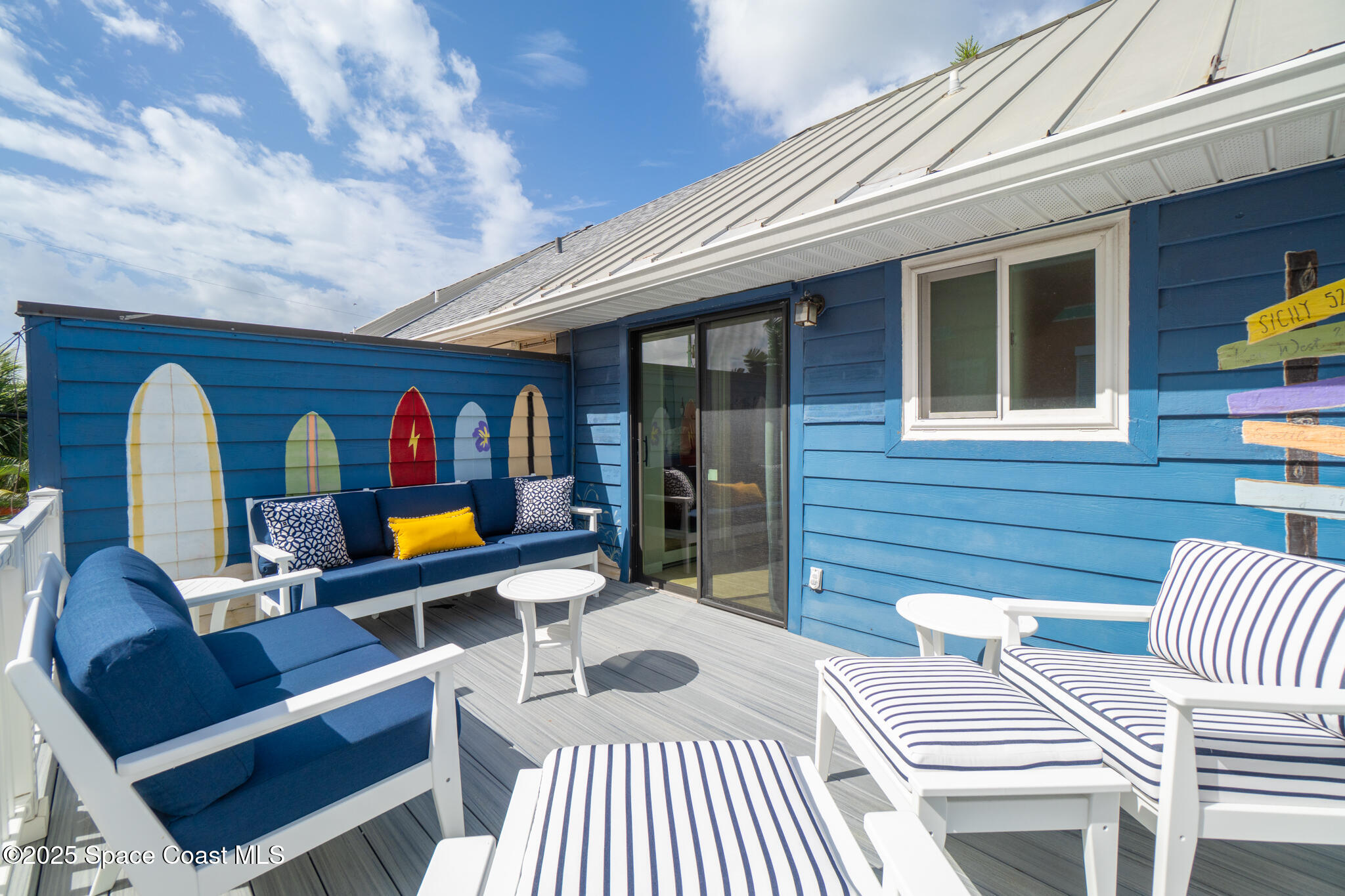 8156 Ridgewood Avenue Cape Canaveral, FL 32920 - Photo 14 of 53 a view of outdoor seating