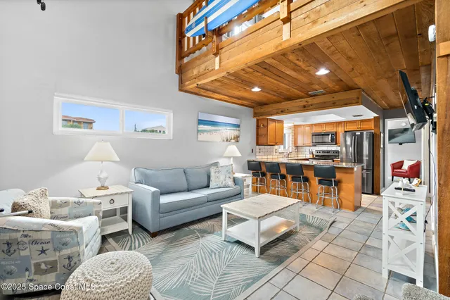 a kitchen with stainless steel appliances a refrigerator stove and sink