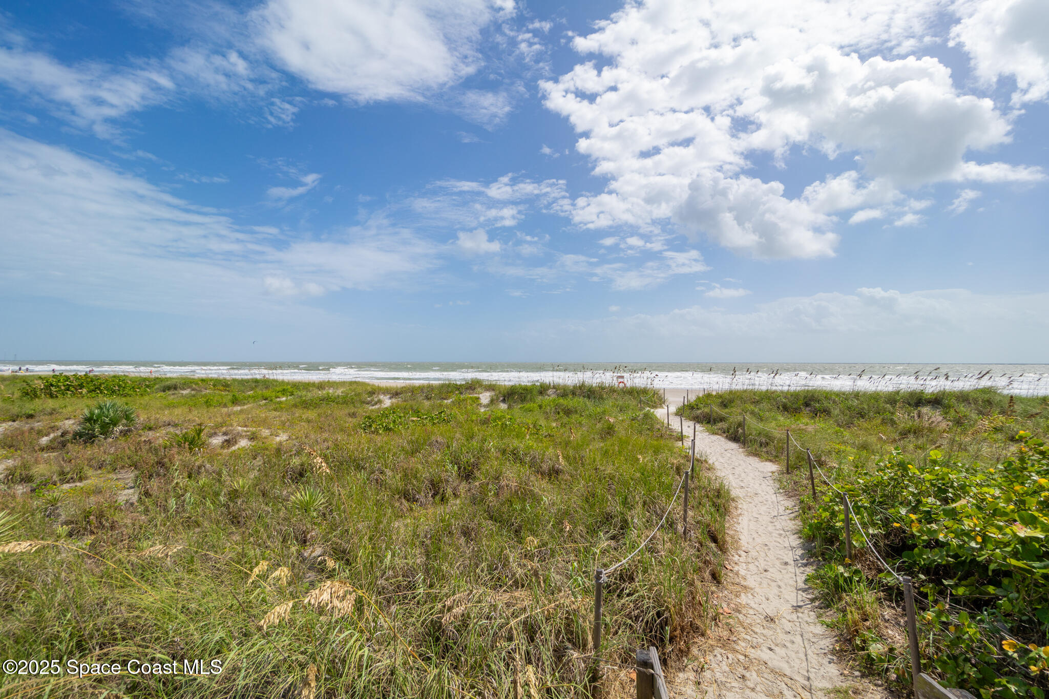 8156 Ridgewood Avenue Cape Canaveral, FL 32920 - Photo 50 of 53 a view of an ocean and beach
