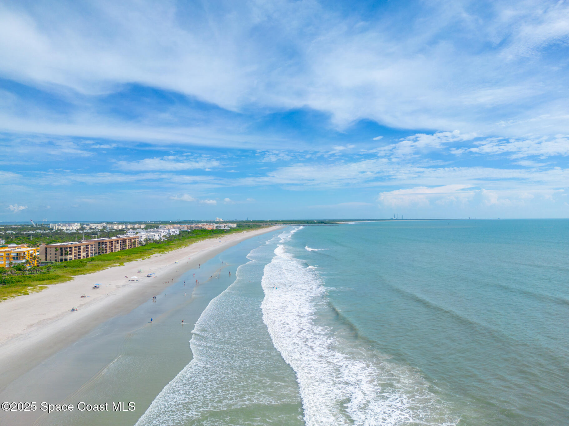 8156 Ridgewood Avenue Cape Canaveral, FL 32920 - Photo 52 of 53 a view of a street with an ocean view