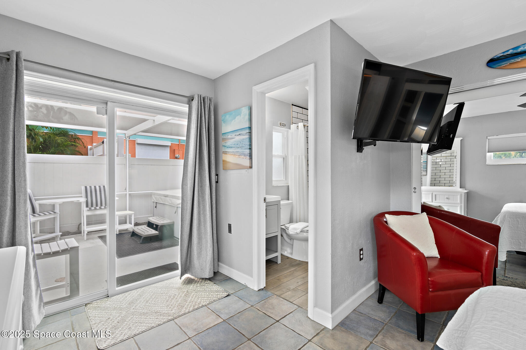 8156 Ridgewood Avenue Cape Canaveral, FL 32920 - Photo 9 of 53 a living room with furniture