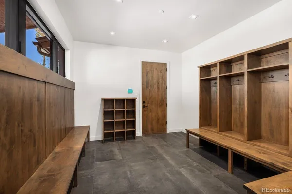 a living room with fireplace furniture and a flat screen tv
