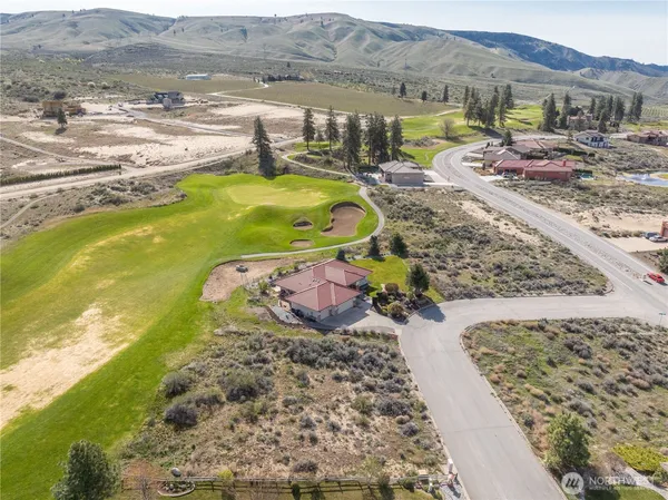 a view of a swimming pool with a lake view