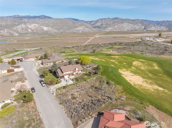 a view of ocean with mountains