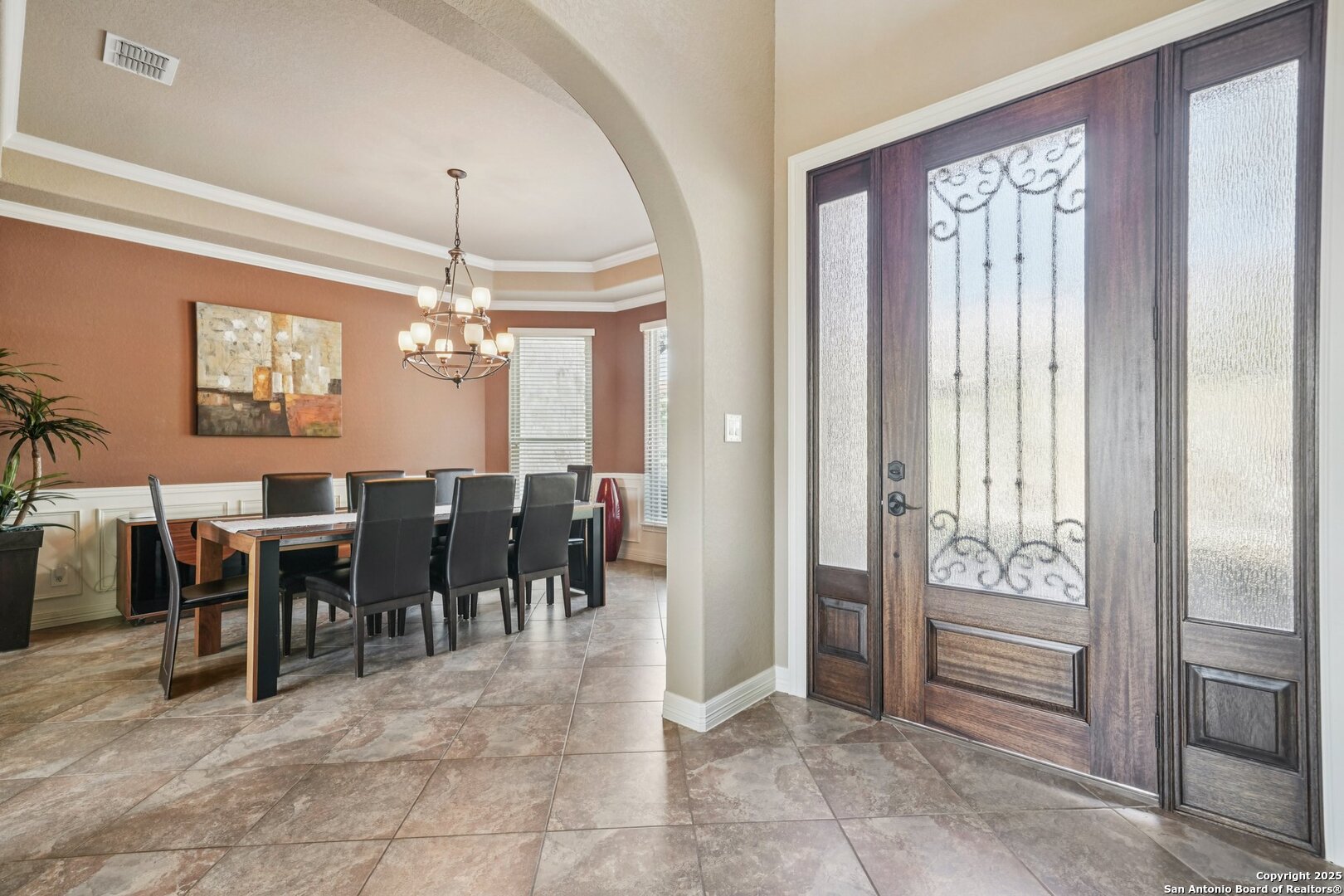 718 Ruidosa Downs Helotes, TX 78023 - Photo 14 of 50 a view of a dining room with furniture and chandelier kitchen