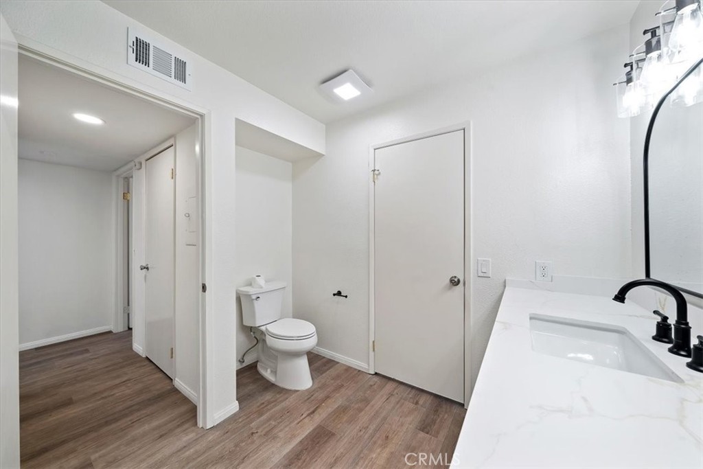 200 East Racquet Club Road, Unit 72 Palm Springs, CA 92262 - Photo 9 of 19 a bathroom with a sink and a mirror