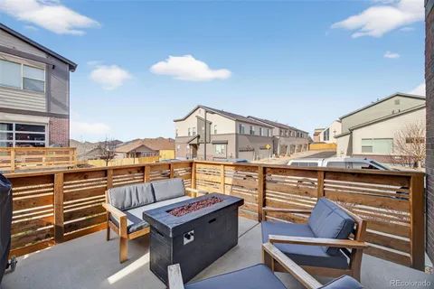 a view of a terrace with outdoor seating