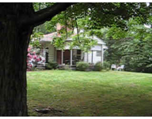 574 Ryan Road Northampton, MA 01062 - Photo 2 of 7 a view of a house with backyard and garden