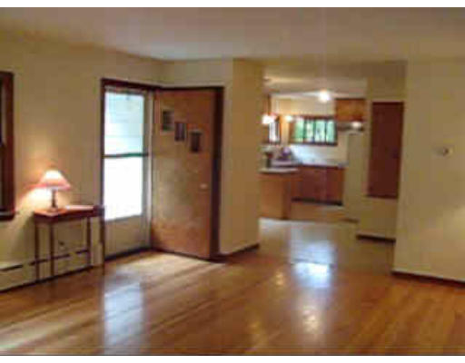 574 Ryan Road Northampton, MA 01062 - Photo 5 of 7 a view of a livingroom with furniture and a window