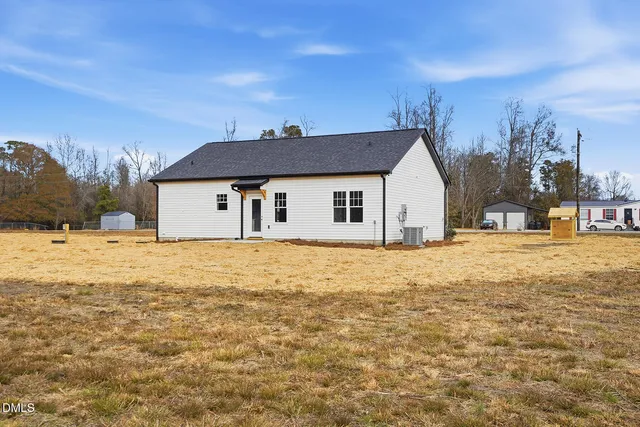 a bathroom with a sink and a yard