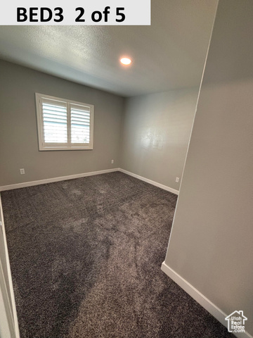 335 Memorial Park Road Henefer, UT 84033 - Photo 19 of 51 Bedroom 3 featuring dark carpet, a textured ceiling, and recessed lighting