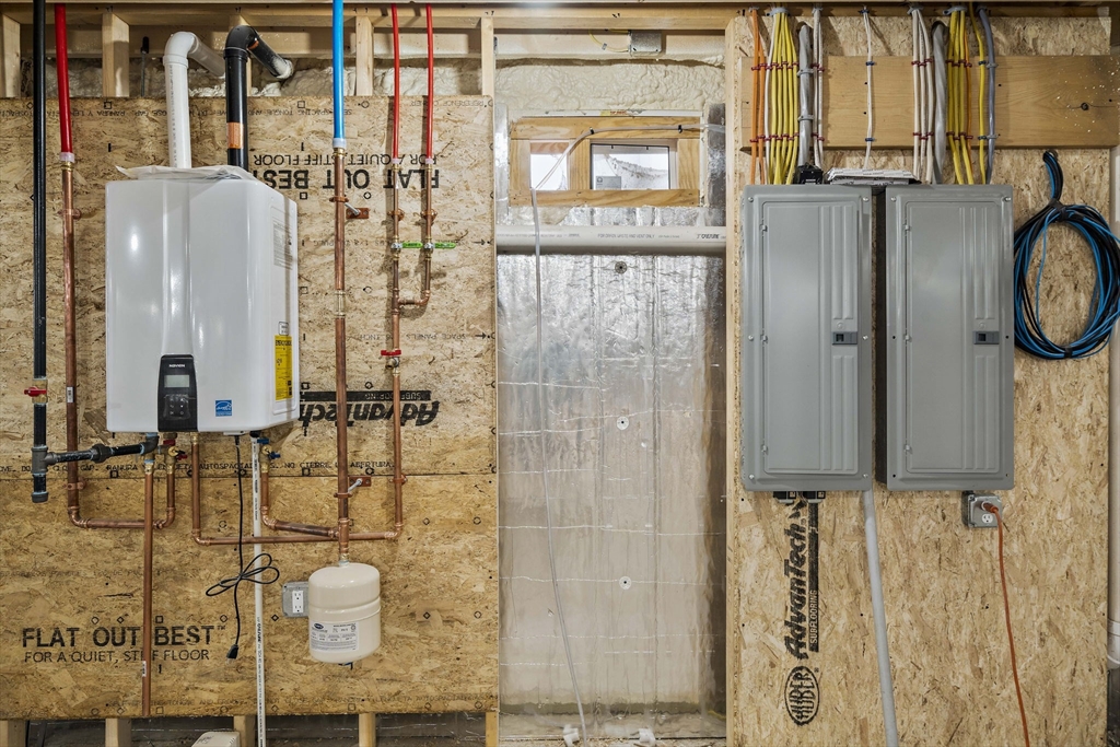 185 Lexington Street Woburn, MA 01801 - Photo 31 of 39 a bathroom with a granite countertop shower and a sink