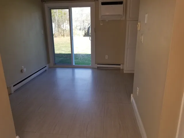 a white refrigerator freezer sitting inside of a kitchen