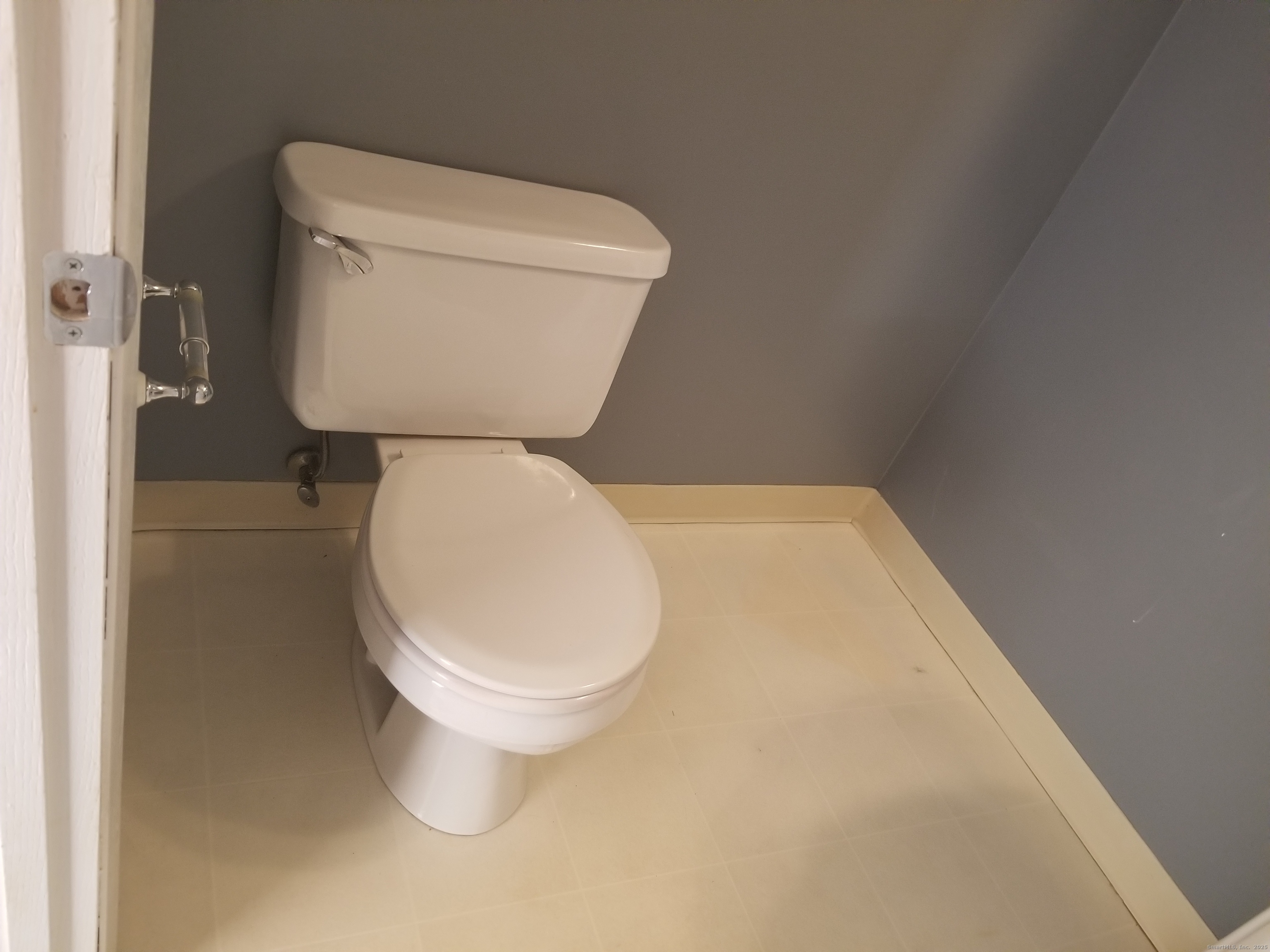 1 Abbott Road, Unit 37 Ellington, CT 06029 - Photo 8 of 22 a white toilet sitting next to a white sink