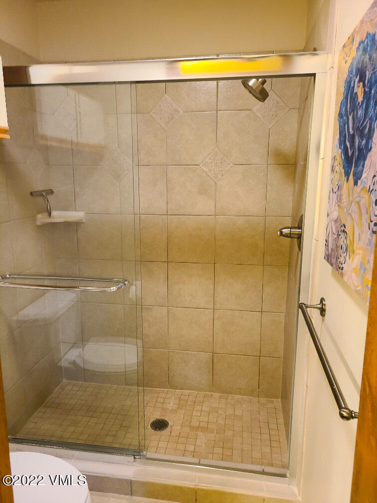 753 Bull Run Eagle, CO 81631 - Photo 13 of 30 a bathroom with a shower