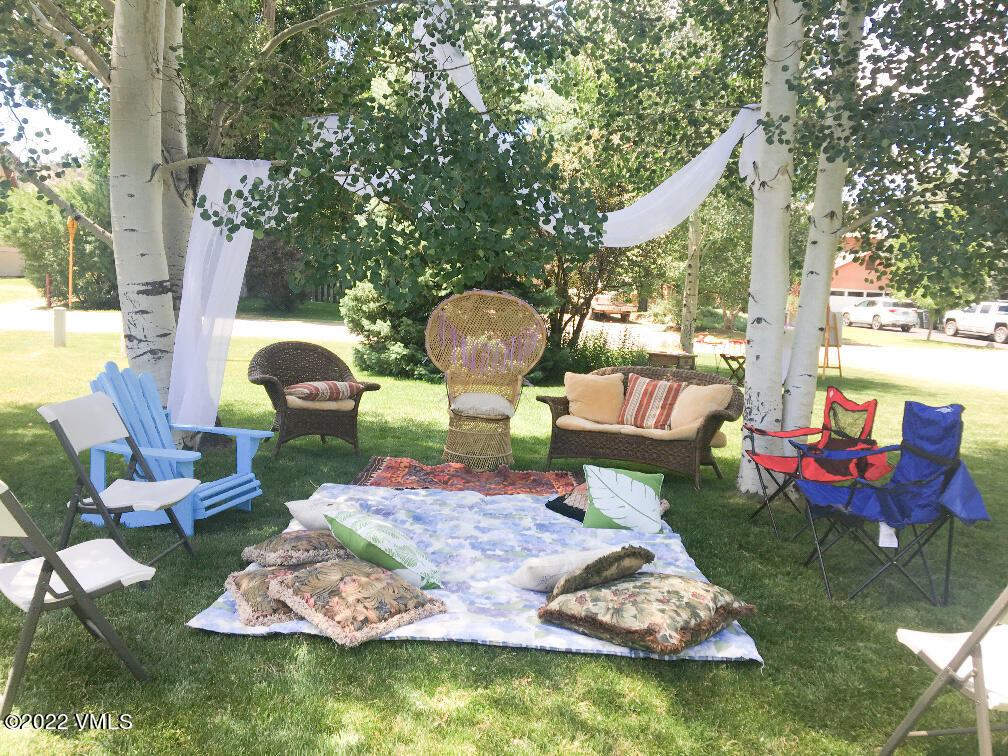 753 Bull Run Eagle, CO 81631 - Photo 26 of 30 a swimming pool with outdoor seating yard and furniture