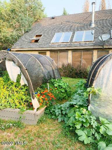 753 Bull Run Eagle, CO 81631 - Photo 27 of 30 a view of a swimming pool with a yard