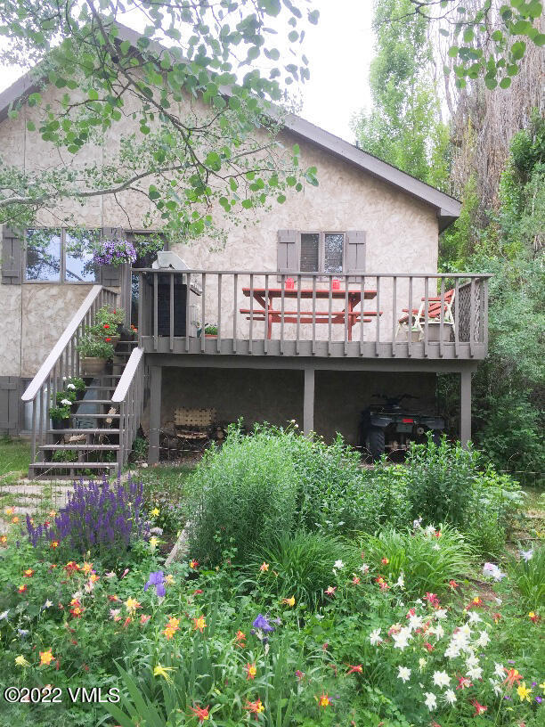 753 Bull Run Eagle, CO 81631 - Photo 6 of 30 a view of a house with a roof deck