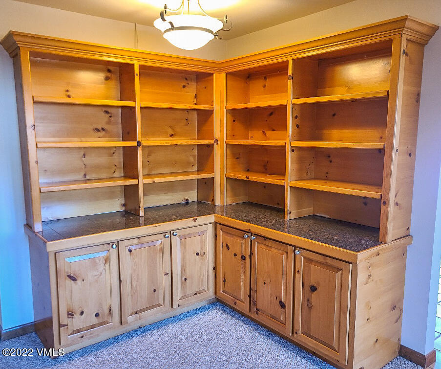 753 Bull Run Eagle, CO 81631 - Photo 10 of 30 a view of an empty room with wooden floor and a window