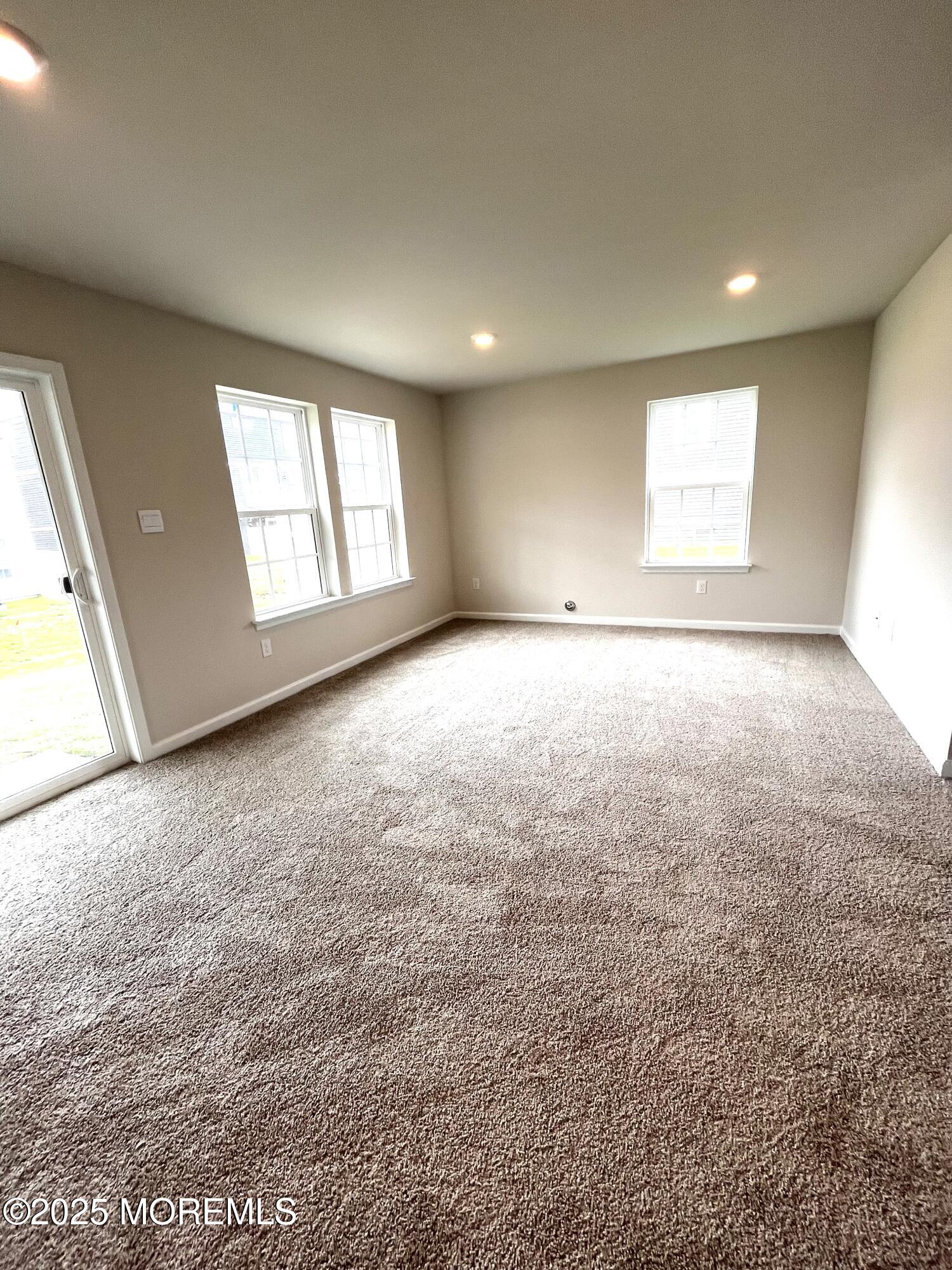 16 Rothbury Court Tinton Falls, NJ 07753 - Photo 23 of 28 an empty room with windows