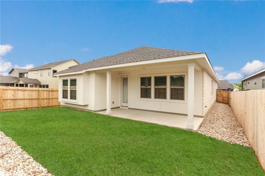 2233 Ringstaff Road Leander, TX 78641 - Photo 10 of 18 a view of a house with a backyard