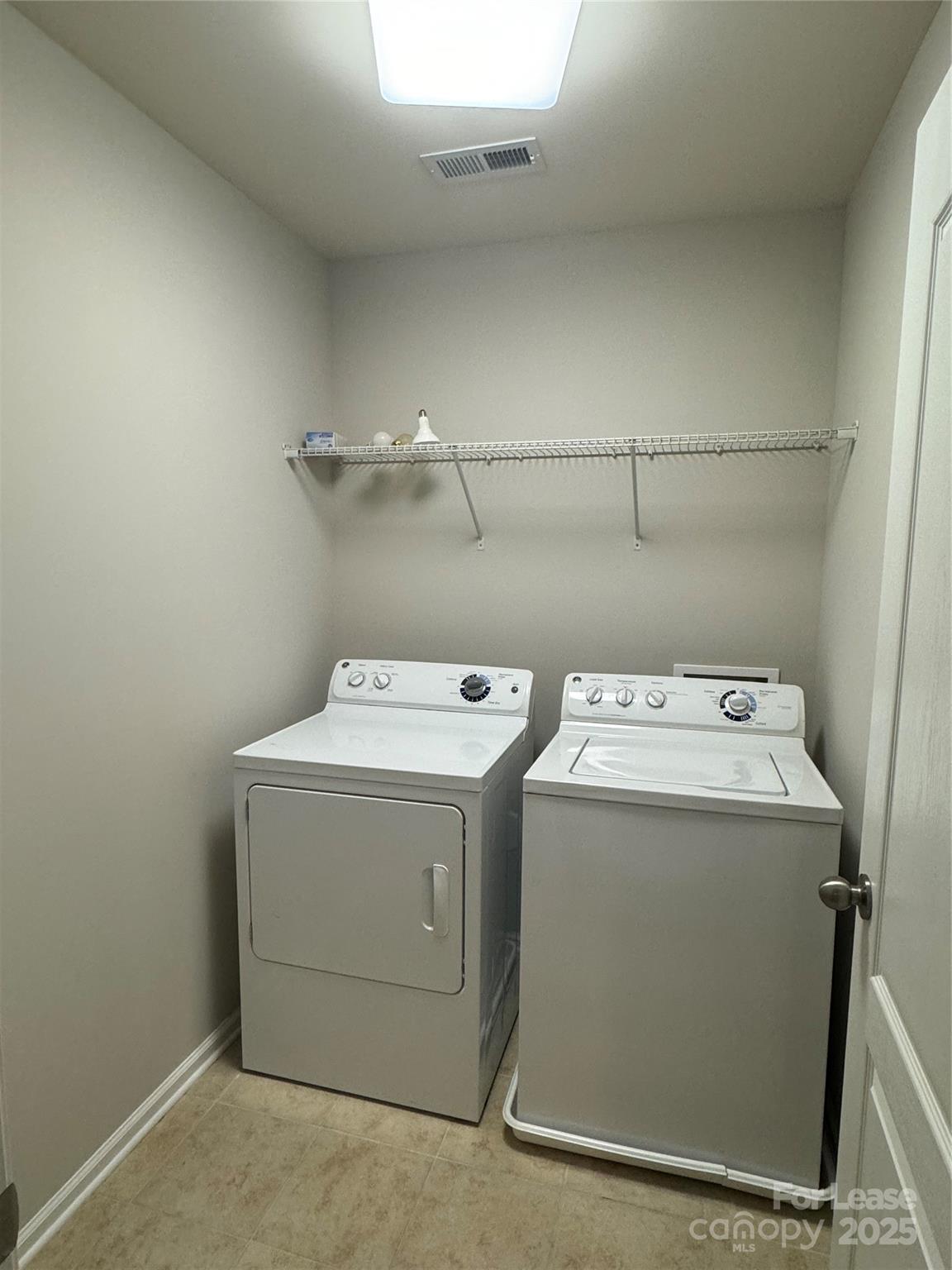 18431 The Commons Boulevard Cornelius, NC 28031 - Photo 16 of 24 a utility room with dryer and washer