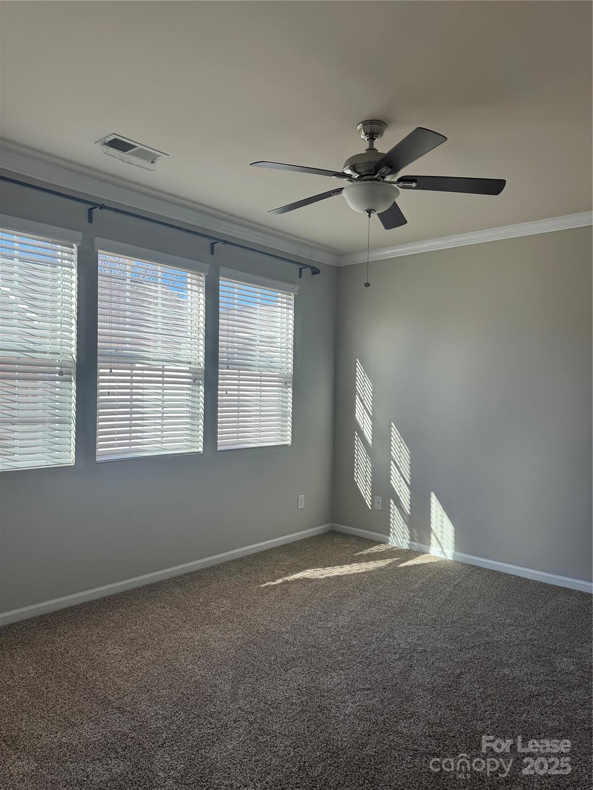 18431 The Commons Boulevard Cornelius, NC 28031 - Photo 10 of 24 a view of an empty room with a window