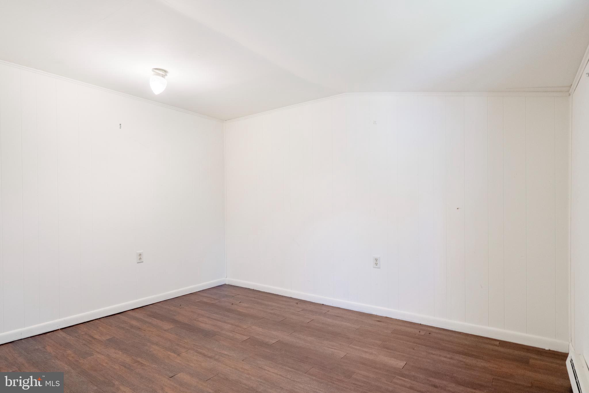 2456 Fairmount Road Hampstead, MD 21074 - Photo 19 of 27 Hardwood Floors in the Bedroom