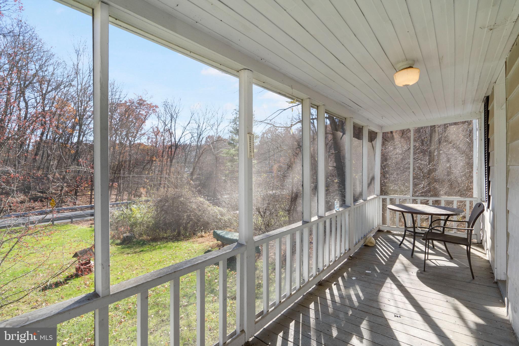 2456 Fairmount Road Hampstead, MD 21074 - Photo 2 of 27 Enjoy a Cup of Coffee on the Screened In Porch