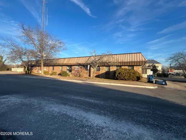 a view of ocean with a yard