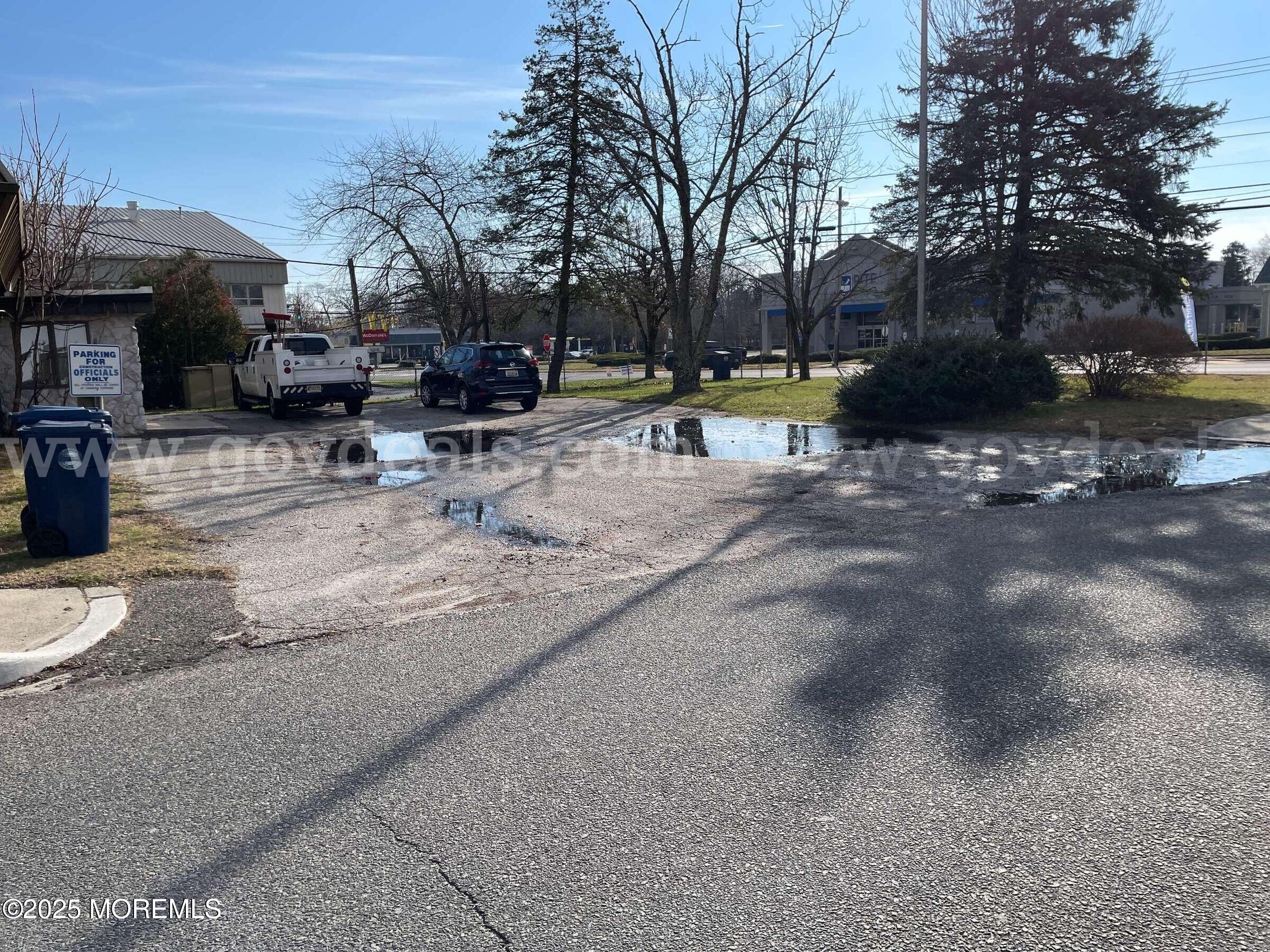 7 Gifford Road Little Egg Harbor, NJ 08087 - Photo 4 of 14 a view of road with large trees