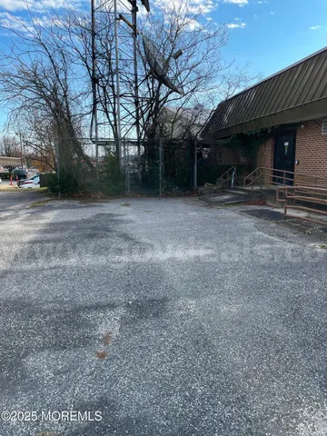 a view of a house and a yard
