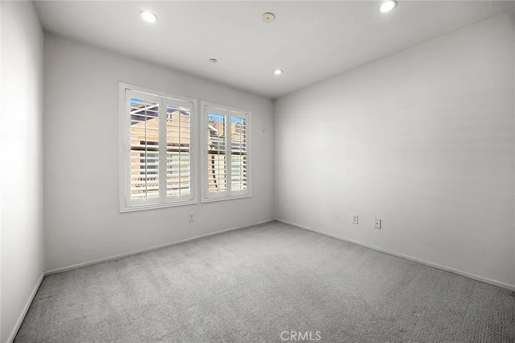 748 Ashby Lane, Unit 55 Brea, CA 92821 - Photo 16 of 41 an empty room with windows