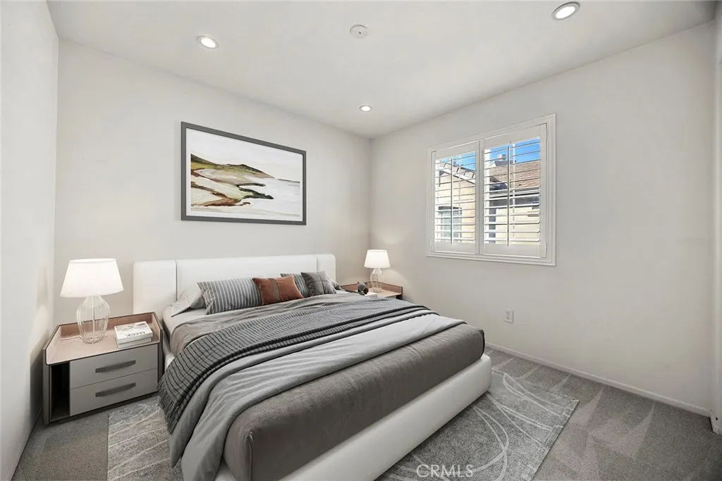 748 Ashby Lane, Unit 55 Brea, CA 92821 - Photo 20 of 41 a bedroom with bed and window