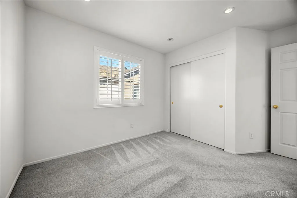 748 Ashby Lane, Unit 55 Brea, CA 92821 - Photo 22 of 41 a view of an empty room with a window
