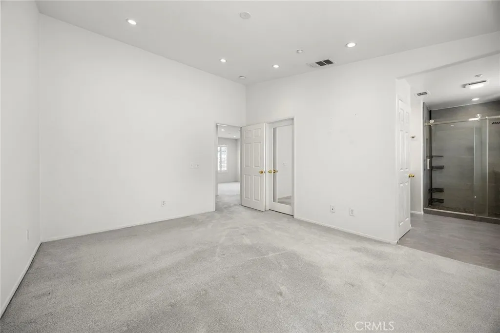 748 Ashby Lane, Unit 55 Brea, CA 92821 - Photo 30 of 41 an empty room with an entryway