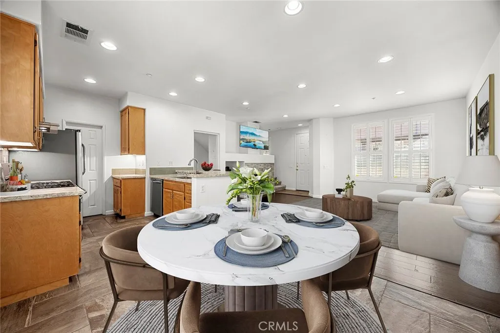 748 Ashby Lane, Unit 55 Brea, CA 92821 - Photo 8 of 41 a view of a dining room with furniture and window