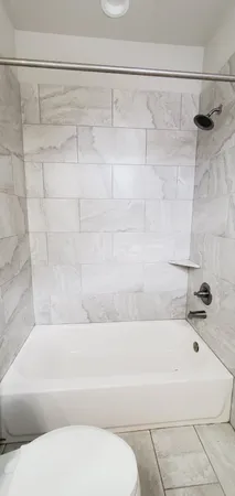 a view of a street with seating area