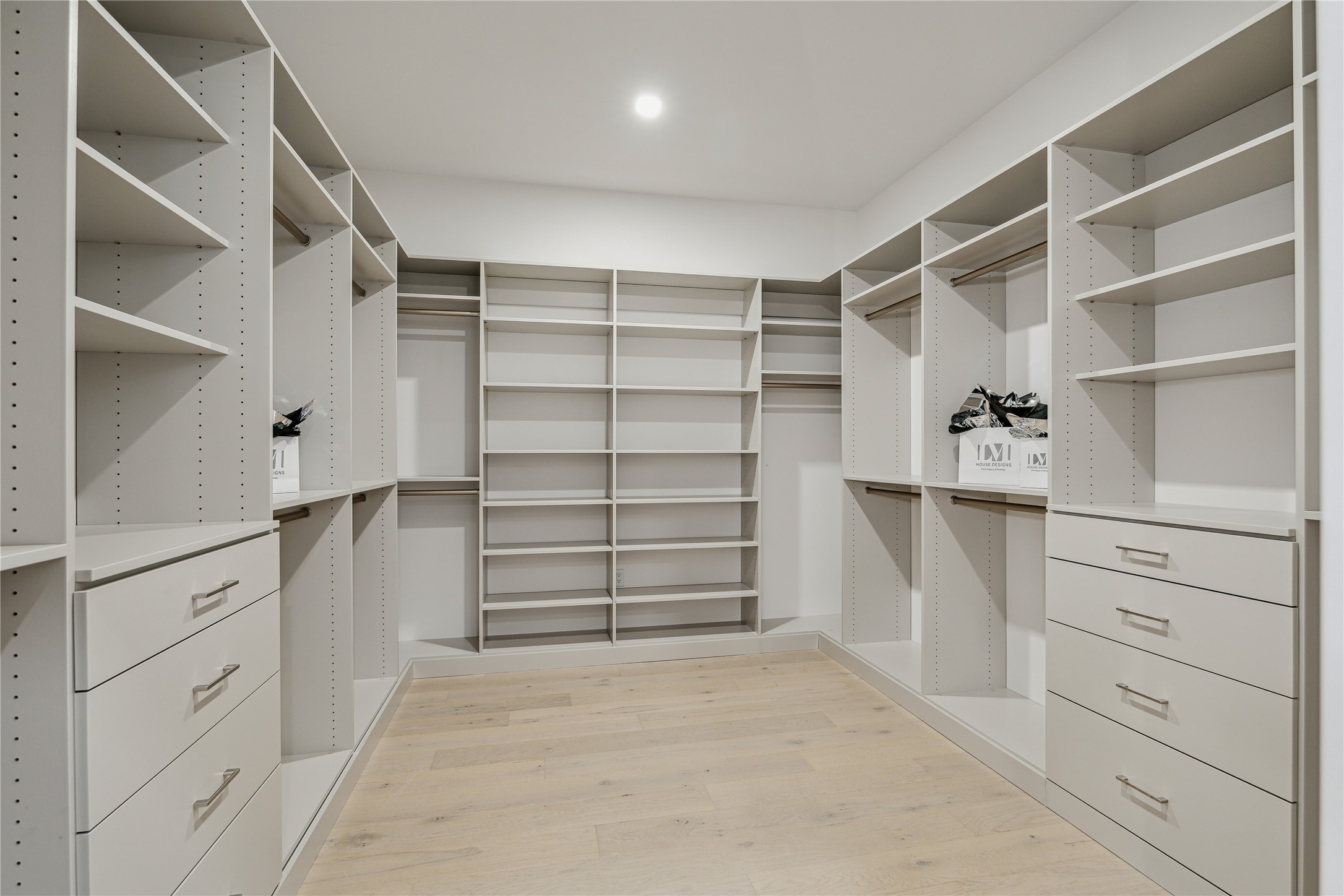 1711 Allen Parkway, Unit 2301 Houston, TX 77019 - Photo 18 of 45 a view of walk in closet with empty racks